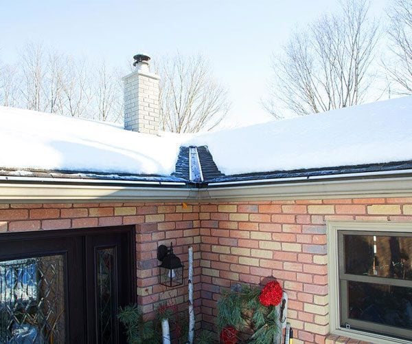 EDGE-CUTTER channel flashings de-icing roof in Winter