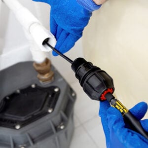 Installing Retro-Line Mini in-pipe freeze protection system in small diameter sump pump drain line